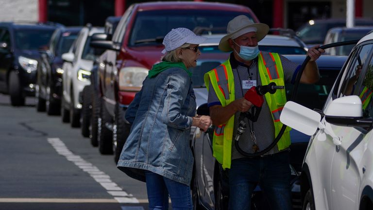 Long queues of cars were seen in parts of the East Coast, including Charlotte North Carolina. The Colonial Pipeline delivers 45% of fuel to the East Coast. Pic AP