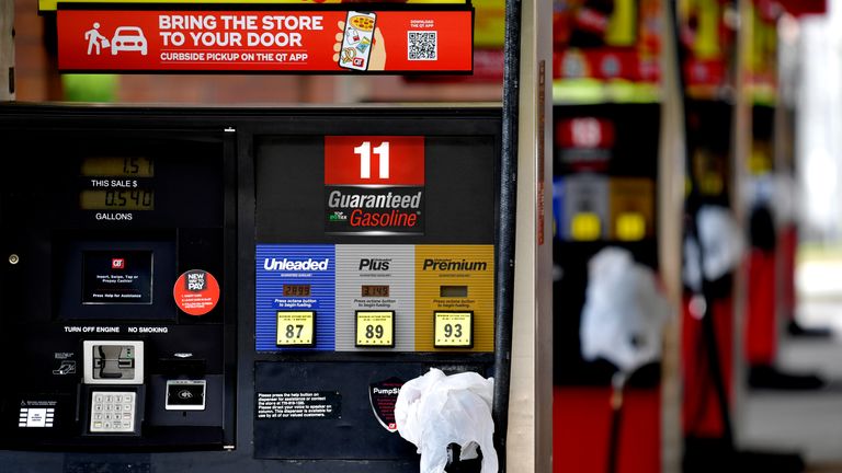 A QuickTrip store in Kennesaw, Georgia has covered pumps with bags after it ran out of petrol on Tuesday. Pic AP