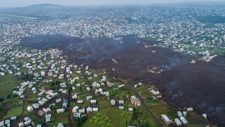 La lava ha distrutto case a Bauhinia, a nord di Goma, in Congo.  Pic: AP