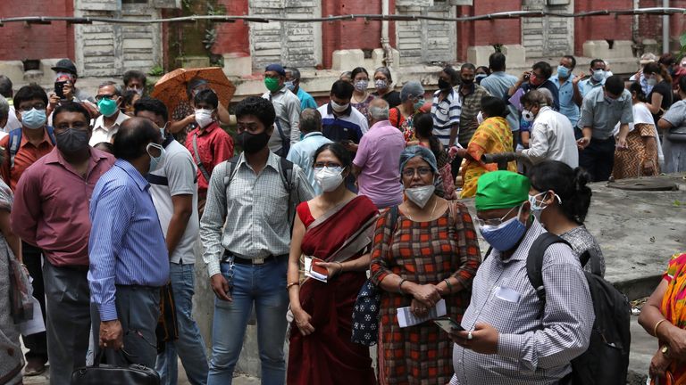 People waiting for a second dose of COVISHIELD, a coronavirus vaccine, in Kolkata