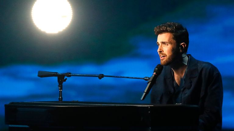 Duncan Laurence of the Netherlands performs the song "Arcade" during the 2019 Eurovision Song Contest grand final in Tel Aviv, Israel, Saturday, May 18, 2019. (AP Photo/Sebastian Scheiner)