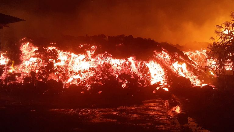 Flowing lava from the volcanic eruption of Mount Nyiragongo, which occurred late on May 22, 2021, is seen in Goma, Democratic Republic of Congo, in this still image from undated video obtained via social media. ENOCH DAVID via REUTERS