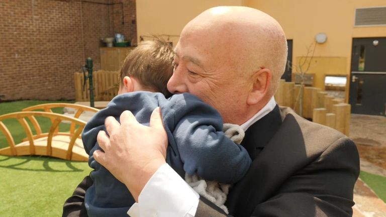 Moment two-year-old Rhu hugs his 76-year-old grandad Tony Chin in Liverpool on the day hugs are allowed.