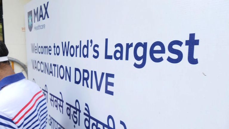 A sign advertising what India says it the world&#39;s largest vaccination drive