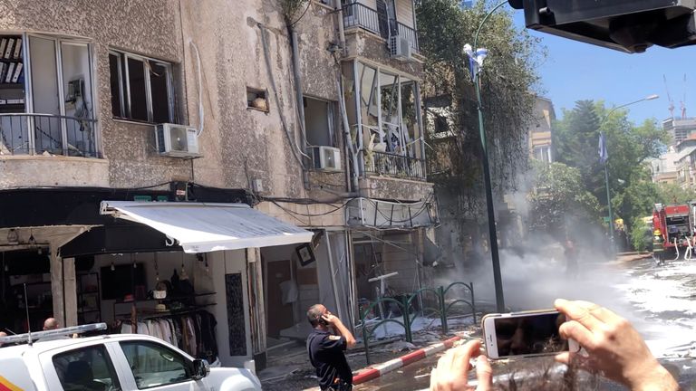 A building damaged by a rocket fired from Gaza, in Ramat Gan, Tel Aviv District