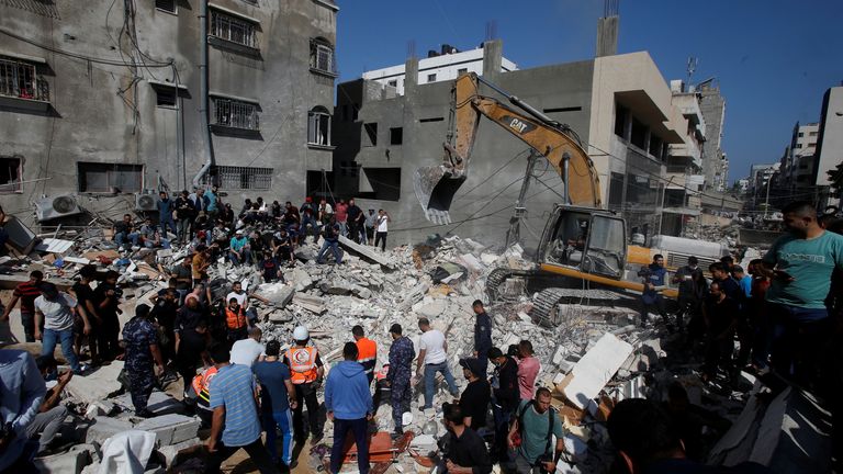 Rescue workers search for victims in Gaza City
