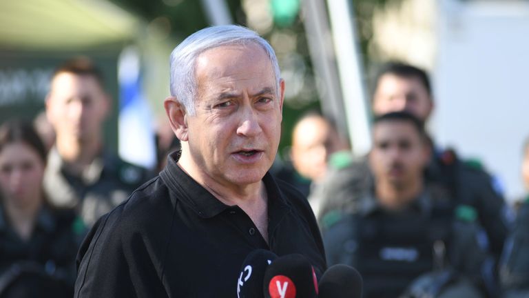 Israeli Prime Minister Benjamin Netanyahu meets with Israeli border police following violence in the Arab-Jewish town of Lod