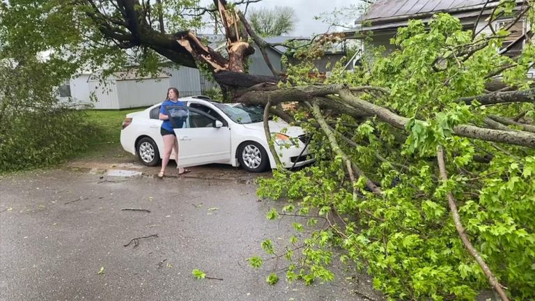 Cars and power lines were damaged in Tompkinsville, Kentucky during a severe storm.