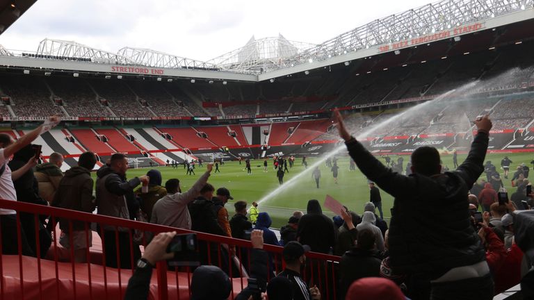FOOTBALL - Manchester United fans protest their bosses ahead of Manchester United v Liverpool Premier League - Manchester, England - May 2, 2021 Manchester United fans protest their bosses ahead of the game Action Images via REUTERS/Carl Recine TPX Images of the Day