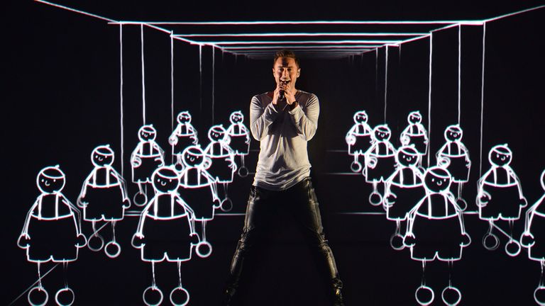 FILE - In this Wednesday, May 20, 2015 file photo, Sweden&#39;s Mans Zelmerlow performs the song &#39;Heroes&#39; during a dress rehearsal for the second semifinal of the Eurovision Song Contest in Austria&#39;s capital Vienna. Zelmerlow won the competition last year with a performance featuring animated dancers. His victory means that Sweden is hosting this year&#39;s event, the final of which is due to take place in the capital Stockholm on Saturday, May 14. (AP Photo/Kerstin Joensson, File)