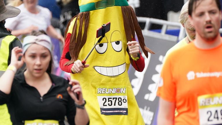 Runners after taking part in the Reunion 5k run at Kempton Park, London