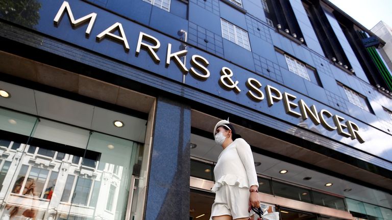 A woman walks past a Marks & Spencer store at Oxford Street, amid the outbreak of the coronavirus disease (COVID-19), in London, Britain, July 20, 2020