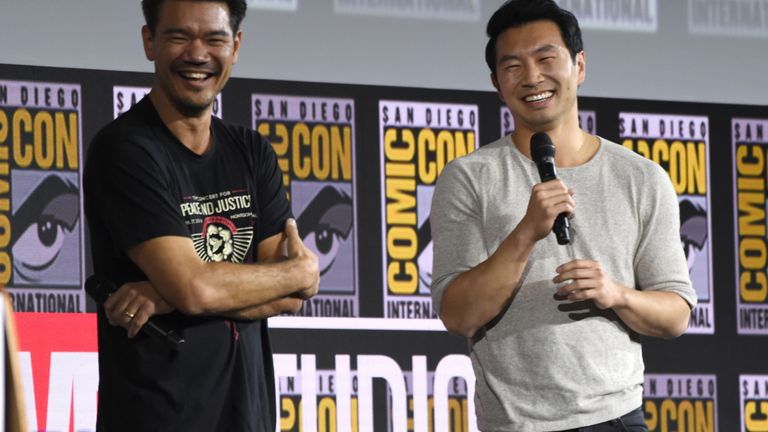 Destin Daniel Cretton, left, and Simu Liu speak at the "Shang-Chi and the legend of the ten rings" part of the Marvel Studios panel during Day 3 of Comic-Con International on Saturday, July 20, 2019 in San Diego.  (Photo by Chris Pizzello / Invision / AP)