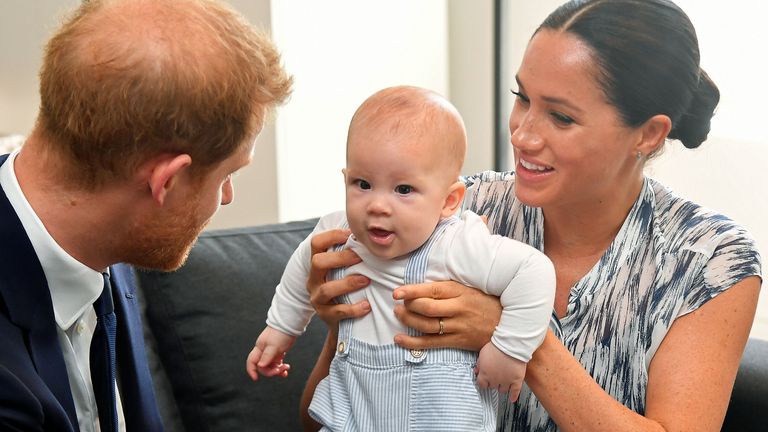 File photo dated 25/09/2019 of the Duke and Duchess of Sussex holding their son Archie during a meeting with Archbishop Desmond Tutu and Mrs Tutu at their legacy foundation in cape Town, on day three of their tour of Africa. Meghan and Harry will celebrate the second birthday of their son, who helped inspire his mother???s new picture book. Issue date: Thursday May 6, 2021.