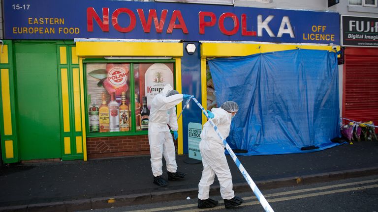 Forensic officers enter a shop on Waterloo Road, Smethwick, after a murder investigation has been launched when a teenager was chased into a shop and stabbed. West Midlands Police said the 17-year-old victim was found with knife wounds by a white Ford Focus which had crashed in the street on Saturday. The force said it is understood that 10 minutes before the victim was taken to hospital, he was chased into a shop in Waterloo Road and attacked with a knife. He was taken to hospital after being f