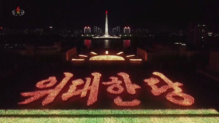 Thousands took part in a torchlight parade in North Korea&#39;s capital Pyongyang to mark the 10th youth congress.