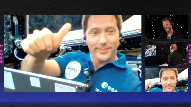 French ESA astronaut Thomas Pesquet gestures during an interview with members of Coldplay, in this still image from an undated handout video. Pic: Coldplay/Handout