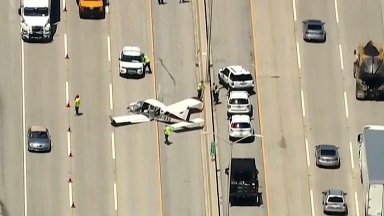 Plane crash lands on highway in Illinois