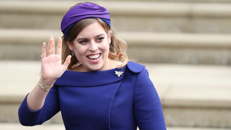 Princess Beatrice arrives for the wedding of Princess Eugenie to Jack Brooksbank at St George&#39;s Chapel in Windsor Castle.
