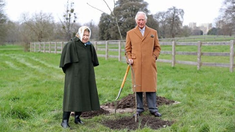 Queen Elizabeth II and the Prince of Wales planting the first Jubilee tree to mark the Queen&#39;s platinum jubilee in the grounds of Windsor Castle, Berkshire, earlier this year.