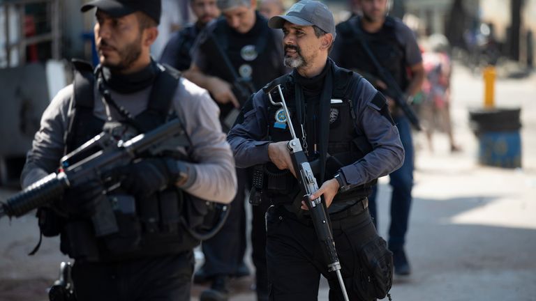 Police conduct an operation against alleged drug traffickers in the Jacarezinho favela of Rio de Janeiro, Brazil, Thursday, May 6, 2021. (AP Photo/Silvia Izquierdo)