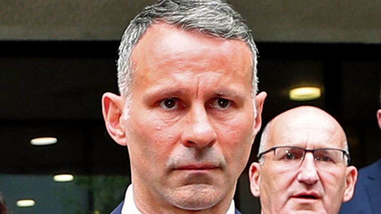 Former Manchester United footballer Ryan Giggs leaves Manchester Crown Court where he was appearing on charges of assault occasioning actual bodily harm to his ex-girlfriend Kate Greville, common assault to her sister Emma Greville, and controlling or coercive behaviour. The case will go to trial at the same court on January 24. Picture date: Friday May 28, 2021.