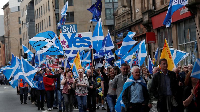Demonstrators carry Scottish flags at a march in support of Scottish independence, in Glasgow, Scotland, Britain June 3, 2017. REUTERS/Russell Cheyne
