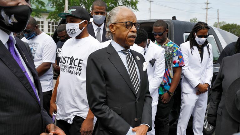 Reverend Al Sharpton leads the family in prayer shortly before the start of a funeral procession for Andrew Brown Jr. in Elizabeth City, North Carolina, U.S., May 3, 2021