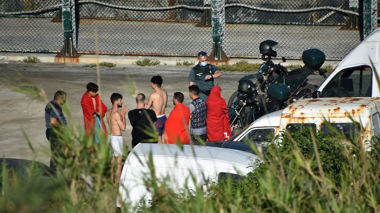 Spanish civil guards met the migrants. Pic: Reduan Ben Zakouor/El Faro de Ceuta via Reuters