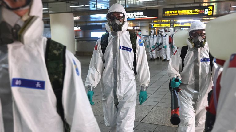Soldiers were sent to disinfect Taipei main station as cases surge
