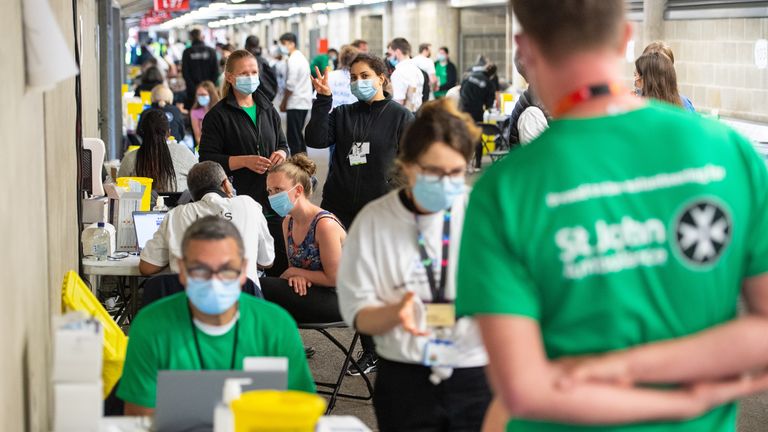 More than 100 vaccinators are working at the stadium