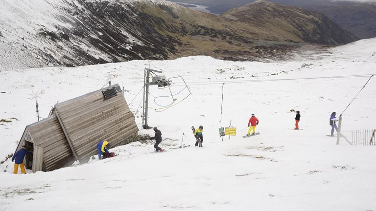 Skiers and snowboarders on the slopes at the Lake District Ski Club on Raise, next to Helvellyn in the Lake District National Park, after an unseasonal May snowfall allowed the reopening of the slopes. Picture date: Thursday May 6, 2021.