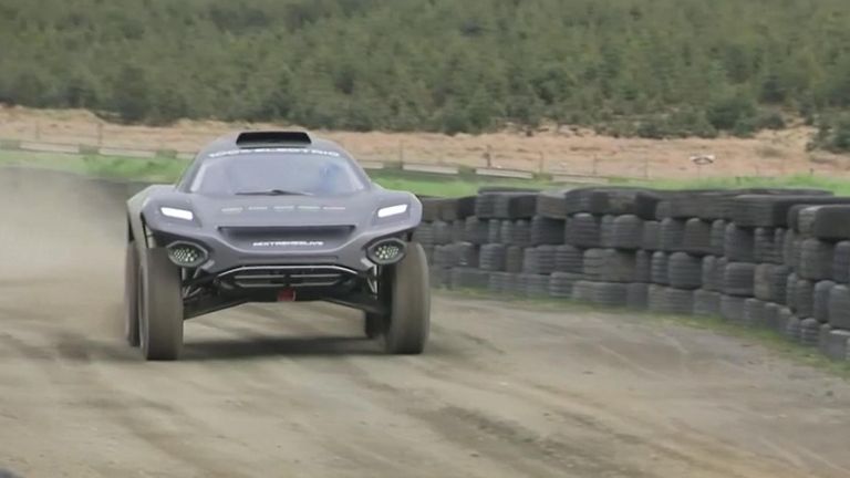Prince William showed off his driving skills behind the wheel of an eco-friendly Extreme E racing car.