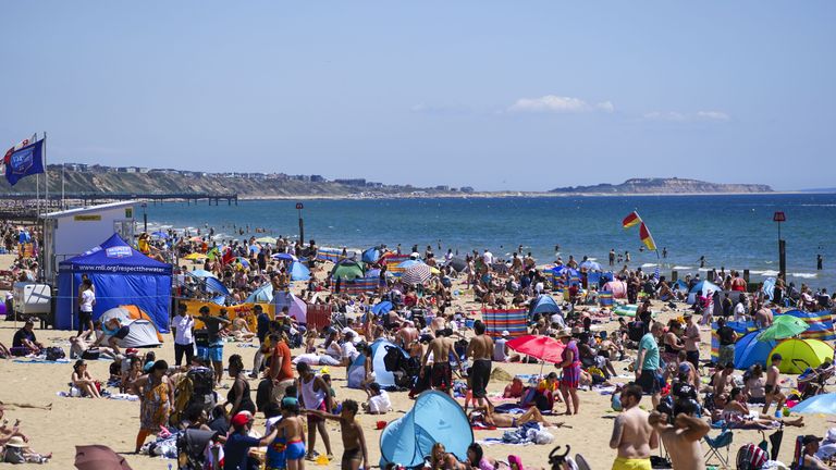 People enjoy the weather on Bournemouth beach in Dorset. Picture date: Saturday June 5, 2021.