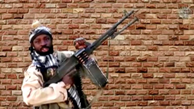 Boko Haram leader Abubakar Shekau holds a weapon in an unknown location in Nigeria in this still image taken from an undated video obtained on January 15, 2018. Pic: Boko Haram Handout/Sahara Reporters