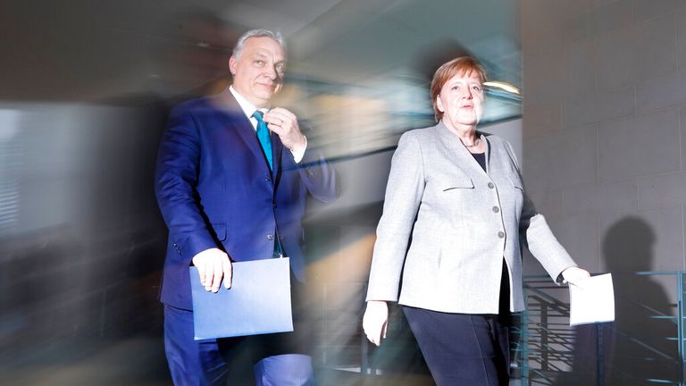 Mr Orban with German Chancellor Angela Merkel in Berlin in 2020. 