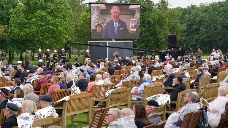 Veterans watch the official opening of the British Normandy Memorial in France via a live feed 