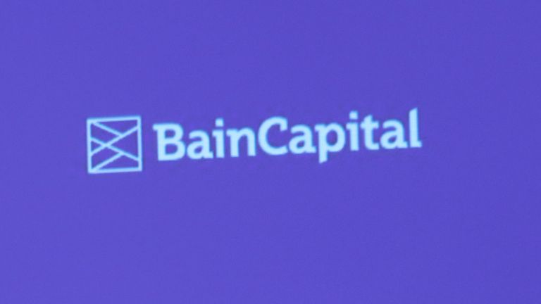 A reporter raises his hand to ask a question during a news conference by Bain Capital LP Managing Director Yuji Sugimoto (not in the picture) in Tokyo, Japan October 5, 2017