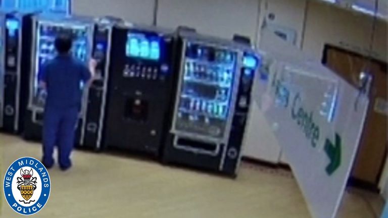 Basharat using the stolen bank card at a vending machine. Pic: West Midlands Police
