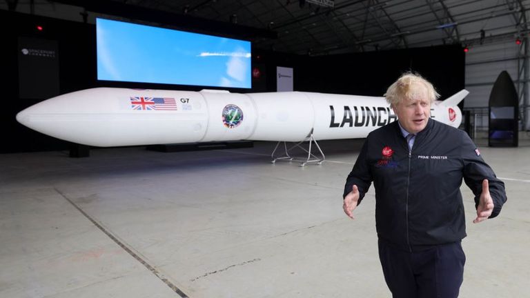Boris Johnson views the LauncherOne at the Spaceport at Newquay Airport. Pic: Andrew Parsons/No 10 Downing Street