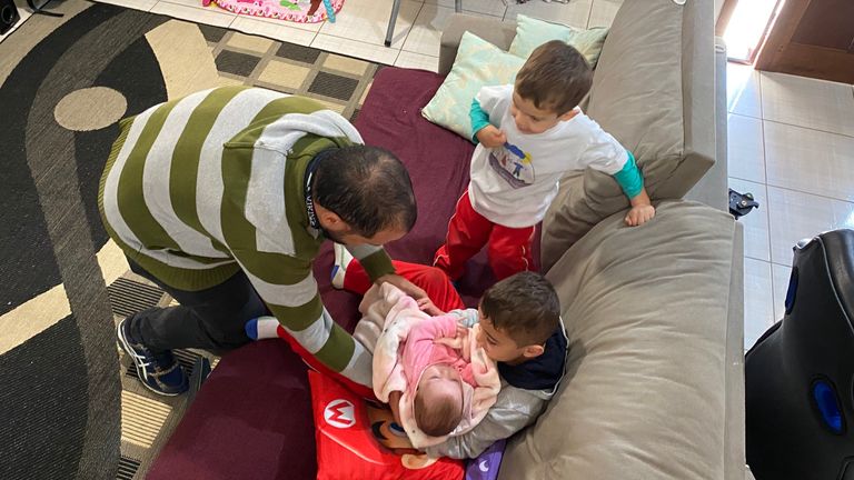 Douglas with his sons, Pedro, 5, and Bento, 3, and their sister, Maria Helena