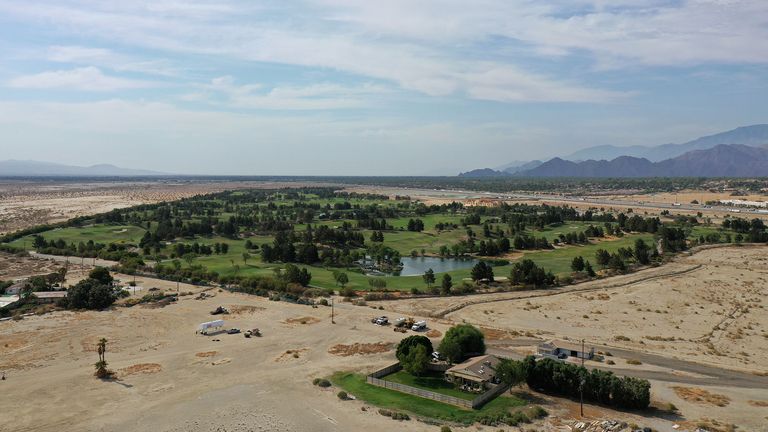 Aerial view of a golf course next to desert landscape as the state faces its worst drought since 1977, in Palm Desert, California, U.S., June 29, 2021. Picture taken with a drone June 29, 2021. REUTERS/Aude Guerrucci TEMPLATE OUT