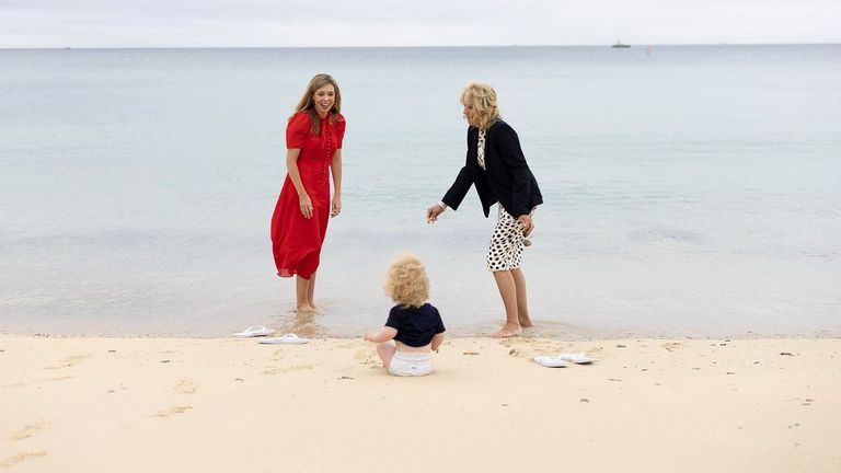 Carrie and Wilfred Johnson with Jill Biden on beach in Carbis Bay, Cornwall. Pic: Flickr/Simon Dawson/No 10 Downing Street