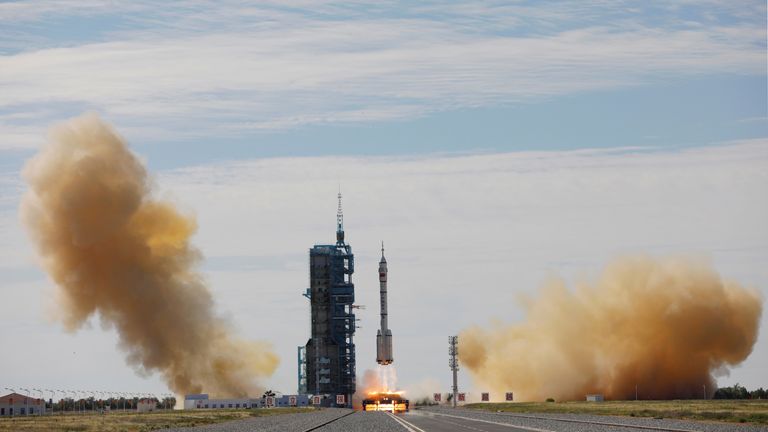 The Long March-2F Y12 rocket, carrying the Shenzhou-12 spacecraft and three astronauts, takes off from Jiuquan Satellite Launch Center for China&#39;s first manned mission to build its space station, near Jiuquan, Gansu province, China June 17, 2021. REUTERS/Carlos Garcia Rawlins