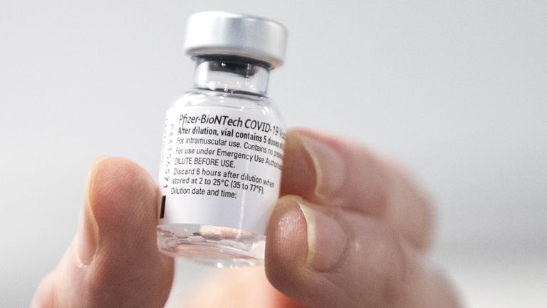 File photo dated 23/01/2021 of a nurse holding a bottle of Pfizer coronavirus vaccine