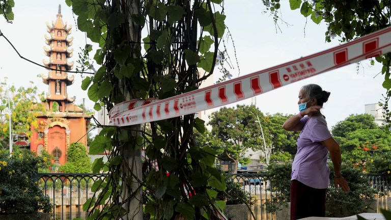 A woman exercises at a park amid the COVID outbreak in Ho Chi Minh city, Vietnam 