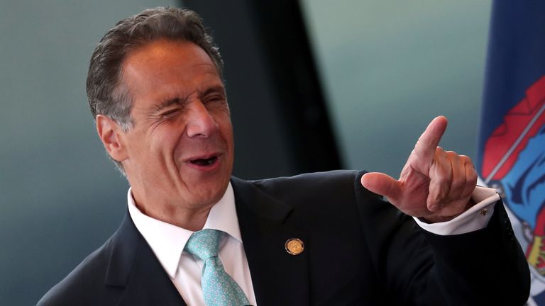 New York Governor Andrew Cuomo winks during his remarks about lifting lockdown rules