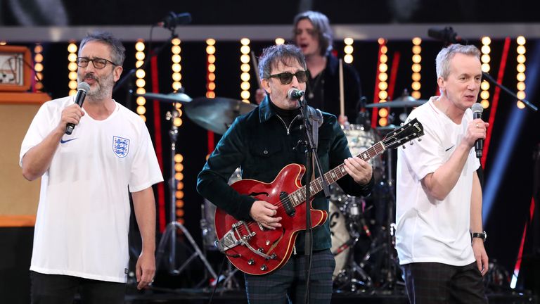 Ian Broudie (centre) of the Lightning Seeds performs with David Baddiel (left) and Frank Skinner