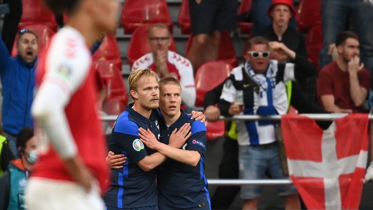 Soccer Football - Euro 2020 - Group B - Denmark v Finland - Parken Stadium, Copenhagen, Denmark - June 12, 2021 Finland&#39;s Joel Pohjanpalo celebrates scoring their first goal with teammate Pool via REUTERS/Jonathan Nackstrand