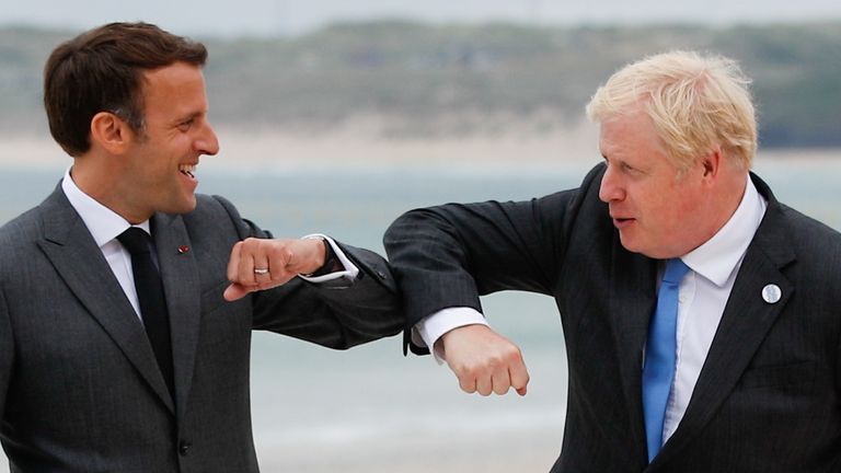Britain&#39;s Prime Minister Boris Johnson greets France&#39;s President Emmanuel Macron, during the G7 summit in Carbis Bay, Cornwall, Britain, June 11, 2021. REUTERS/Phil Noble/Pool
